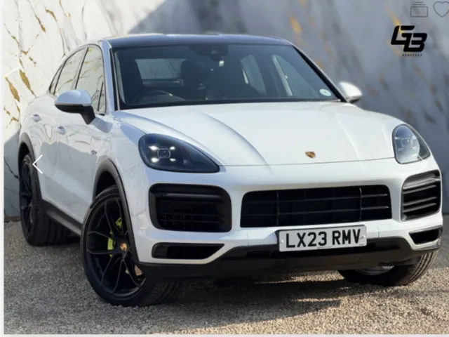 Porsche Cayenne E-Hybrid Coupe in Carrara White — premium car valuation